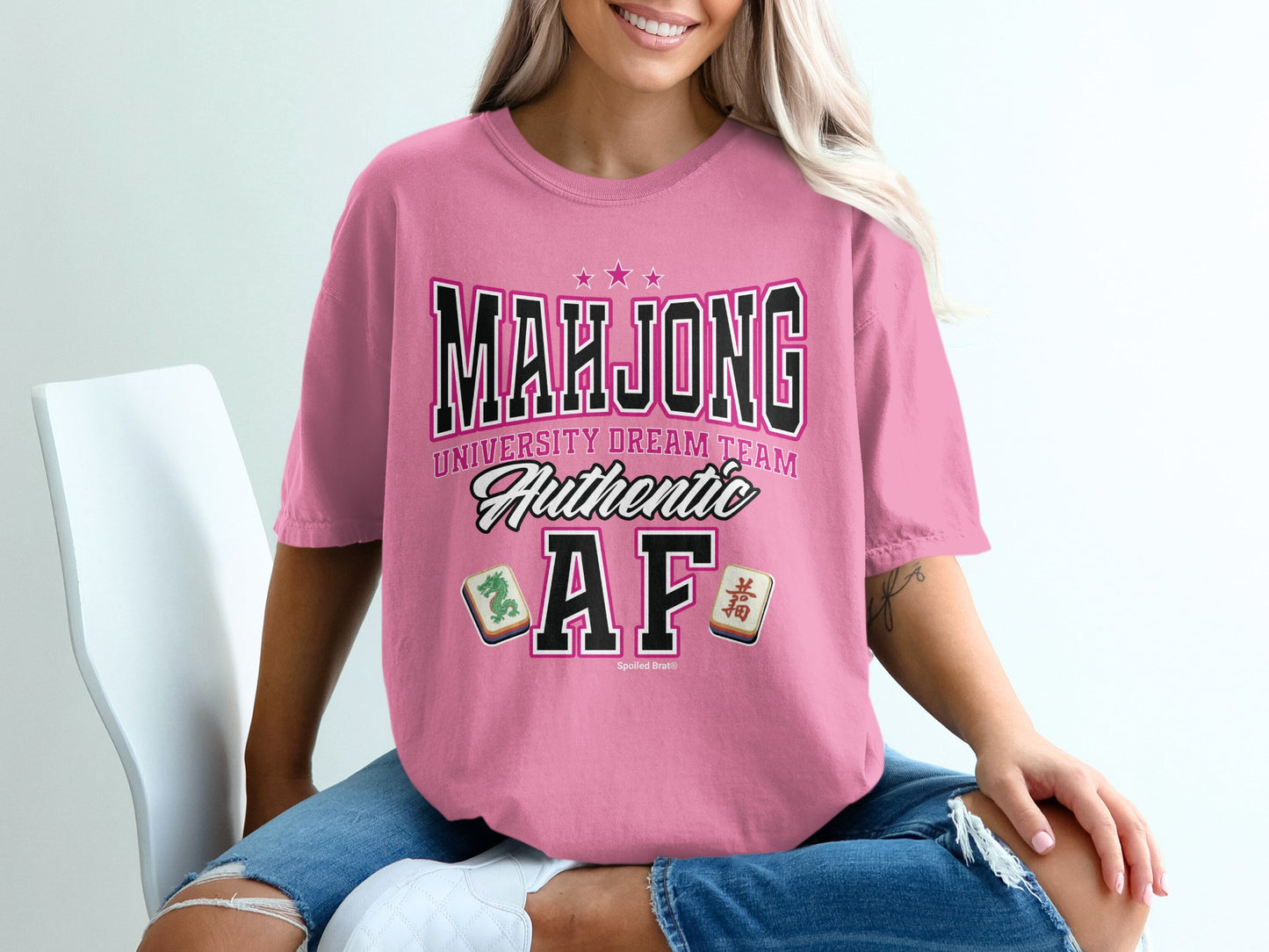 Pink t-shirt with "Mahjong University Dream Team Authentic AF" text.
