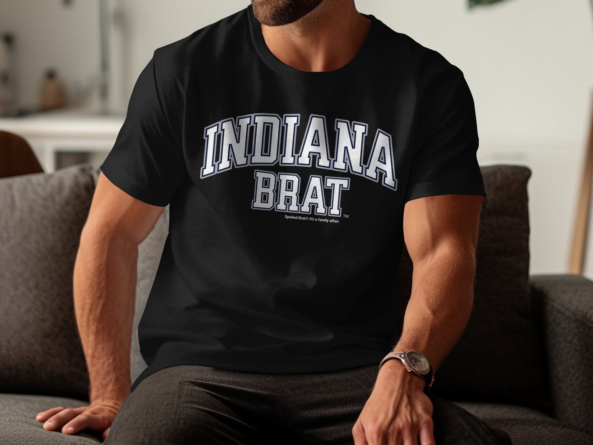 Black t-shirt with "INDIANA BRAT" in white arched text.