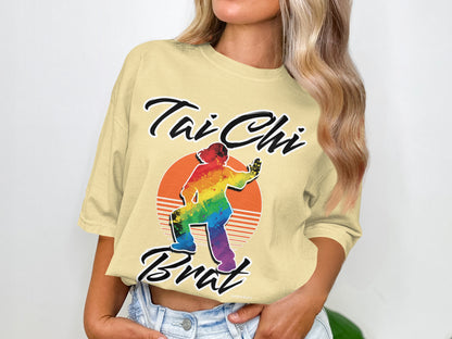 Yellow t-shirt with rainbow Tai Chi figure and "Tai Chi Brat" text.