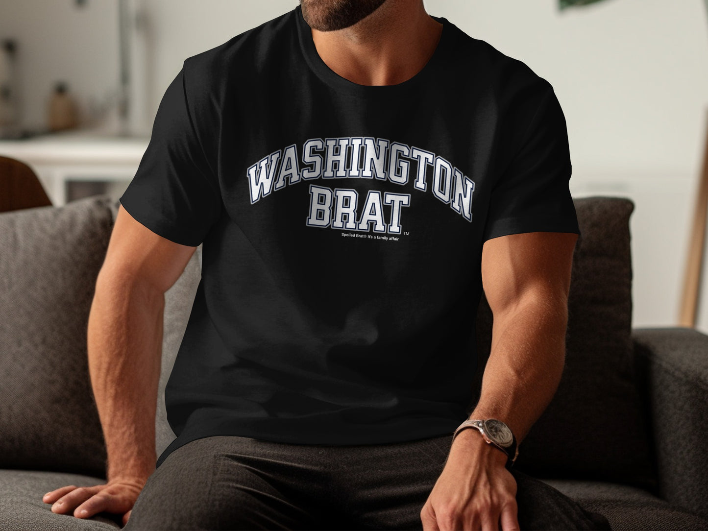 Black t-shirt with "WASHINGTON BRAT" text in white arched lettering.