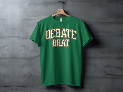 Green t-shirt with "DEBATE BRAT" text in white and gold lettering.
