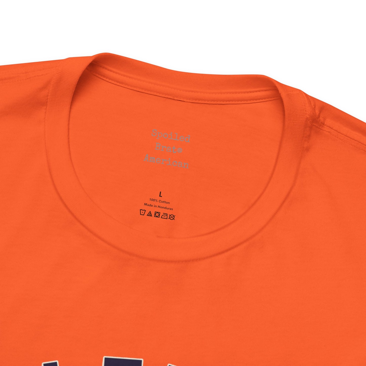 Orange t-shirt with "Bottled Brain American" printed on the tag.