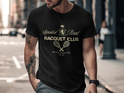 Black t-shirt with "Spoiled Brat. Racquet Club" logo and "New York - London - Paris Est. 1989".
