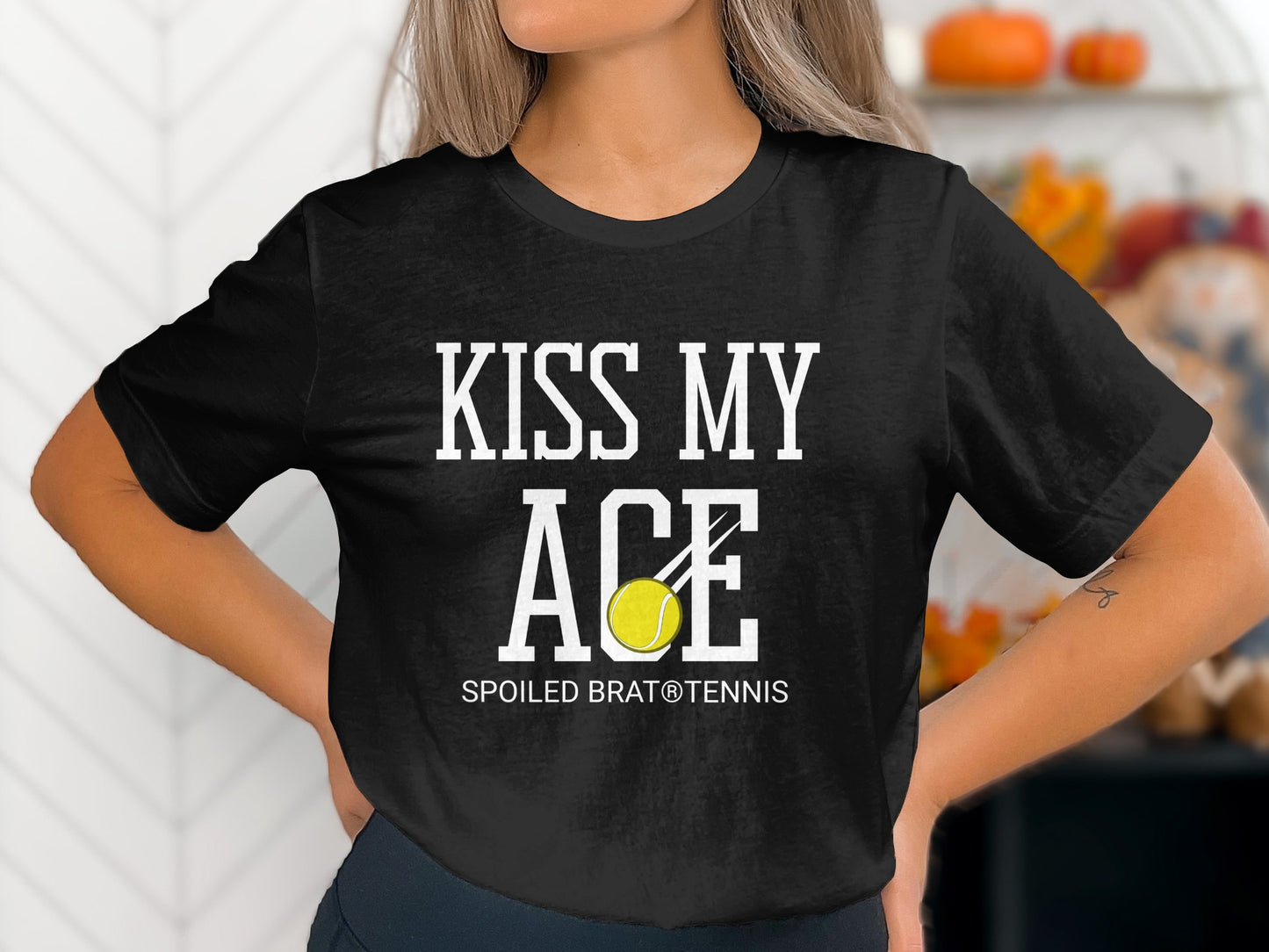 Black t-shirt with "KISS MY ACE" and tennis ball graphic.
