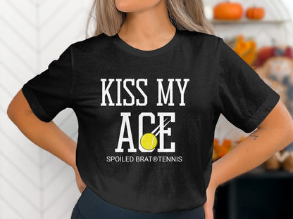 Black t-shirt with "KISS MY ACE" and tennis ball graphic.