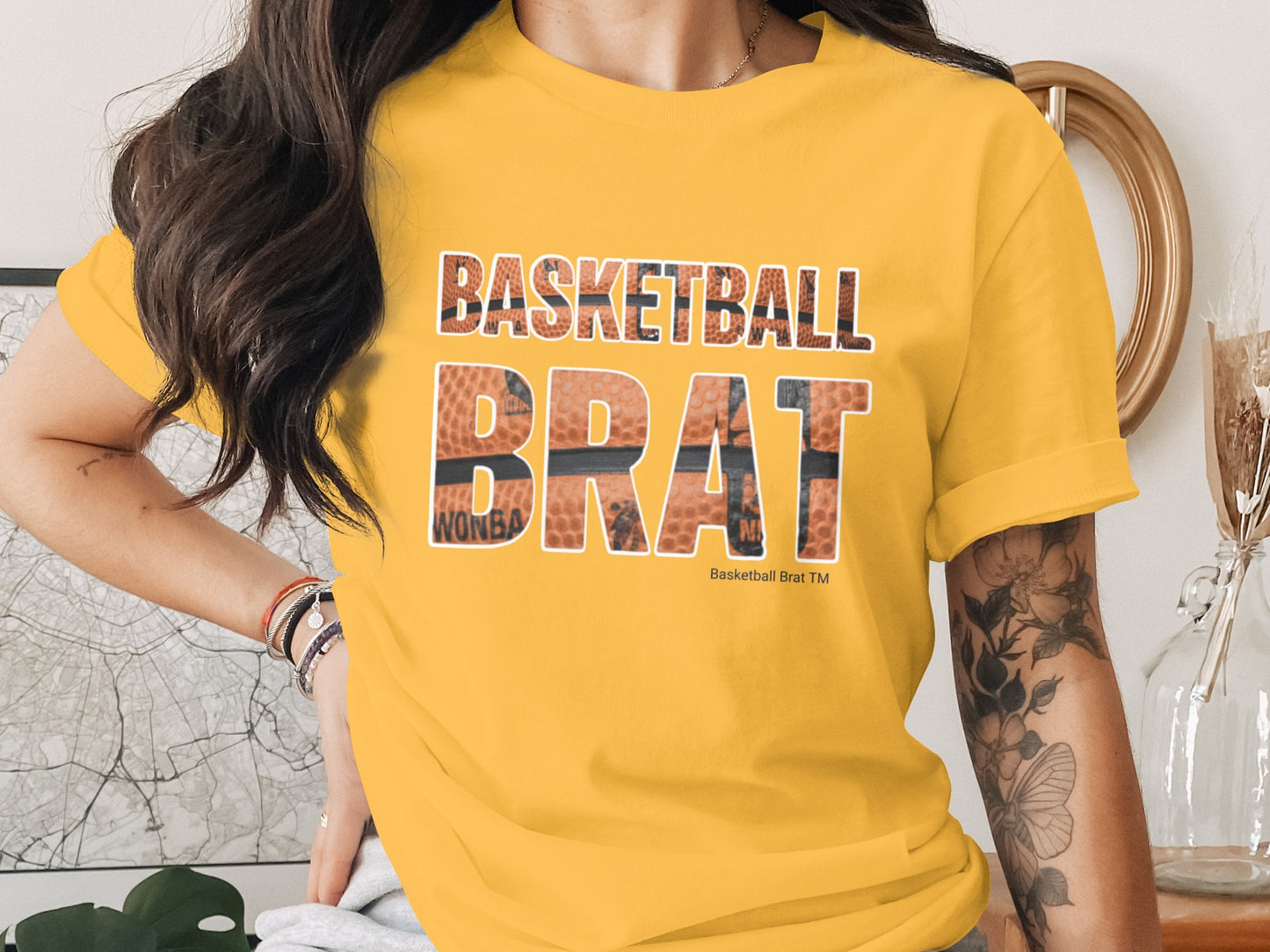 Yellow t-shirt with "Basketball Brat" text and basketball texture.