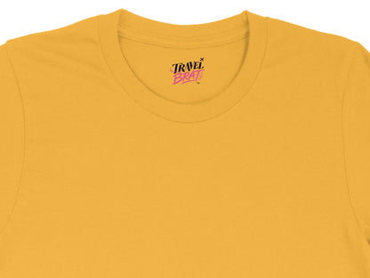 Yellow t-shirt with 'Travel Brat' logo printed on the neckline.