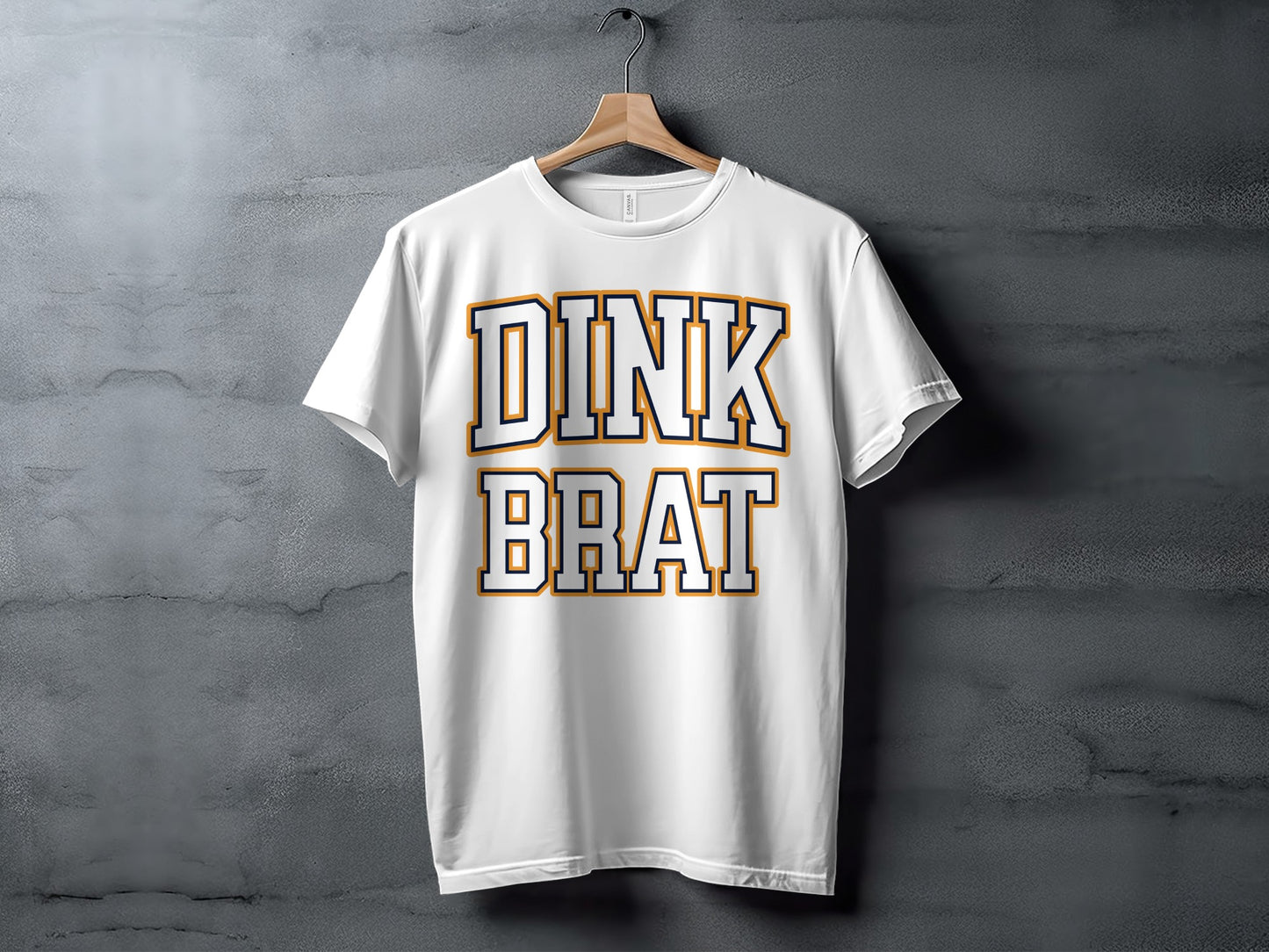 White t-shirt with "DINK BRAT" text in collegiate style font.