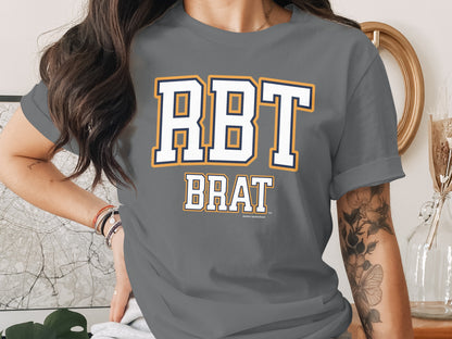 Grey t-shirt with "RBT BRAT" text and "Another Spoiled Brat" small text.