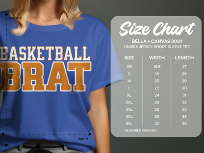 Blue t-shirt with "BASKETBALL BRAT" in orange, next to a size chart.