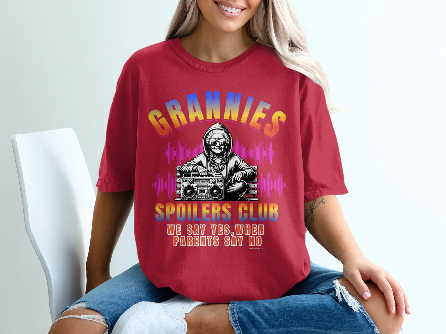 Red t-shirt with "Grannies Spoilers Club" and skull DJ design.