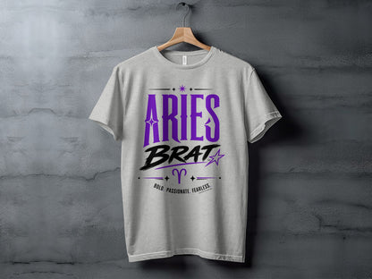 Grey t-shirt with "Aries Brat" in purple and black, Aries symbol, and text.