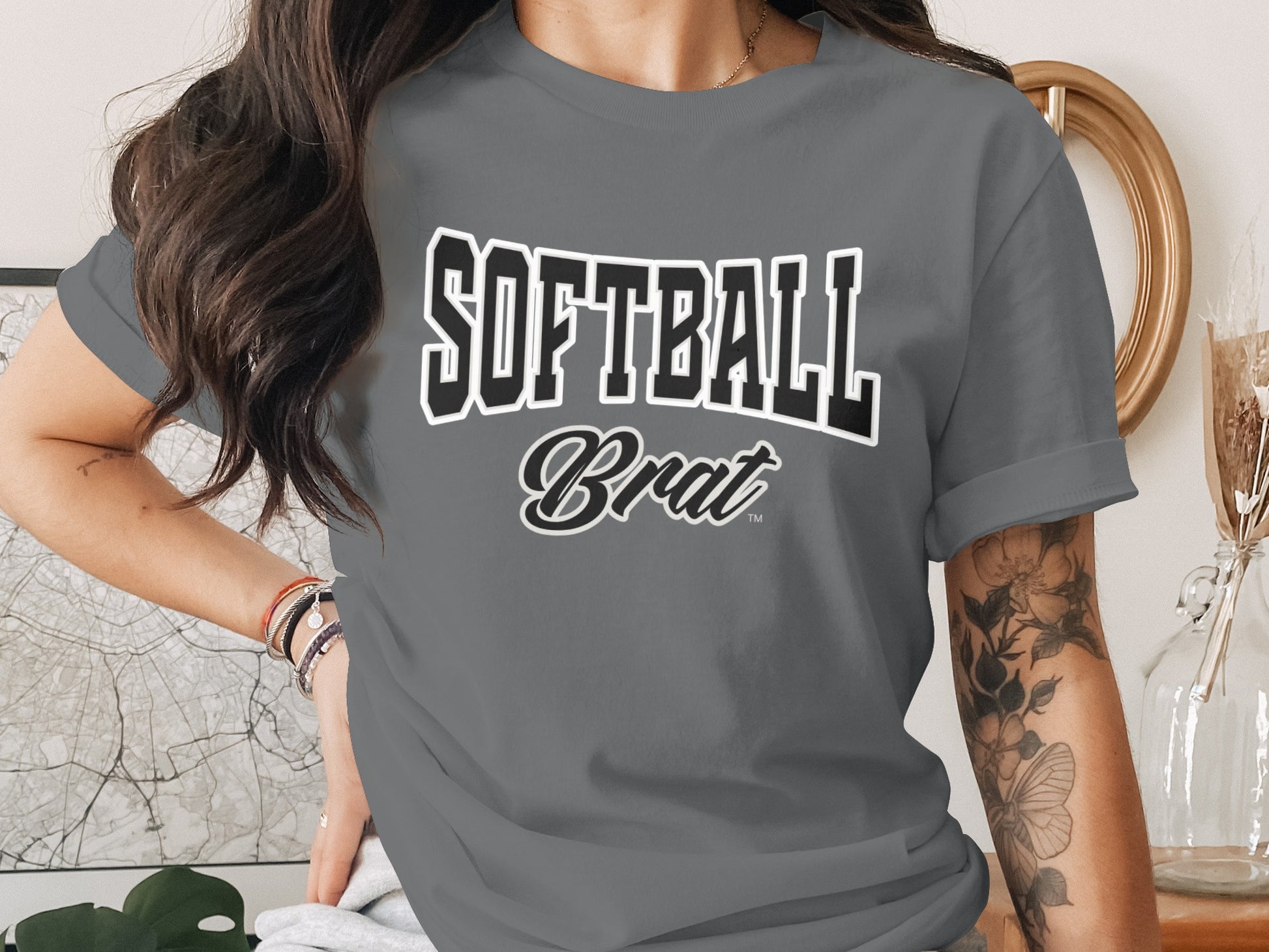 Grey t-shirt with "SOFTBALL Brat" text in black and white athletic font.