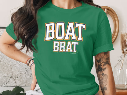 Green t-shirt with "BOAT BRAT" text and "Another Spoiled Brat" logo.