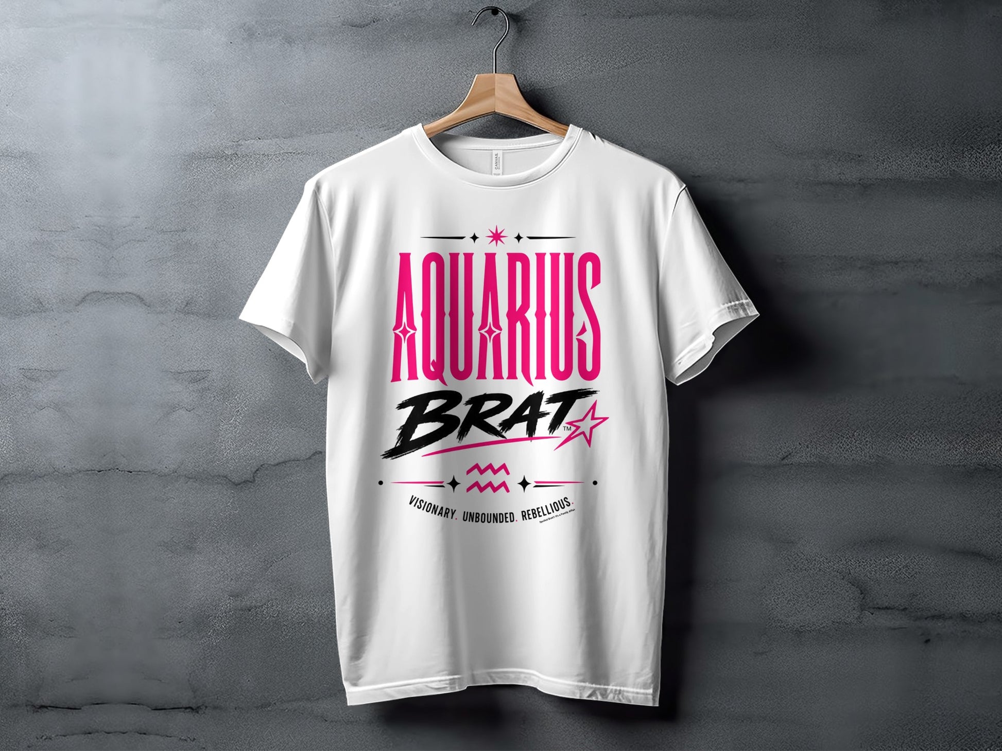 White t-shirt with pink "AQUARIUS BRAT" text and zodiac symbols.