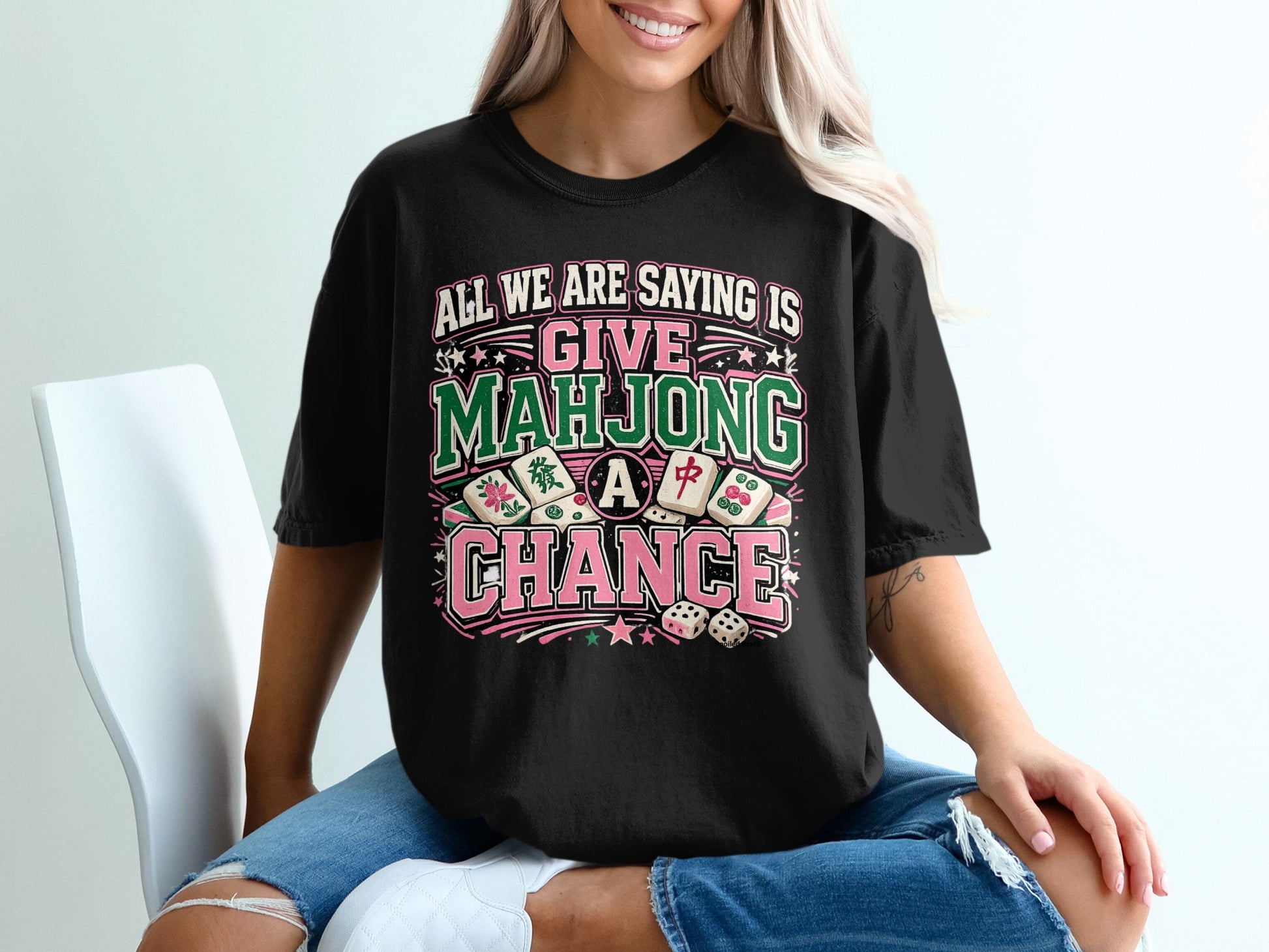 Black t-shirt with "Give Mahjong A Chance" text and mahjong tiles.