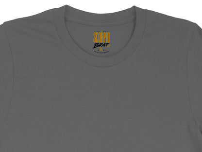 Dark grey t-shirt with "SCORPIO BRAT" and descriptive text on the label.