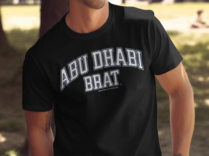 Black t-shirt with white text "ABU DHABI BRAT".