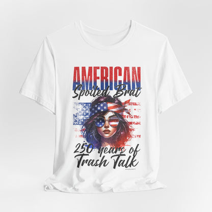 White t-shirt with "American Spoiled Brat" and a distressed flag design.
