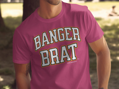 Pink t-shirt with "BANGGR BRAT" text in white and gold lettering.