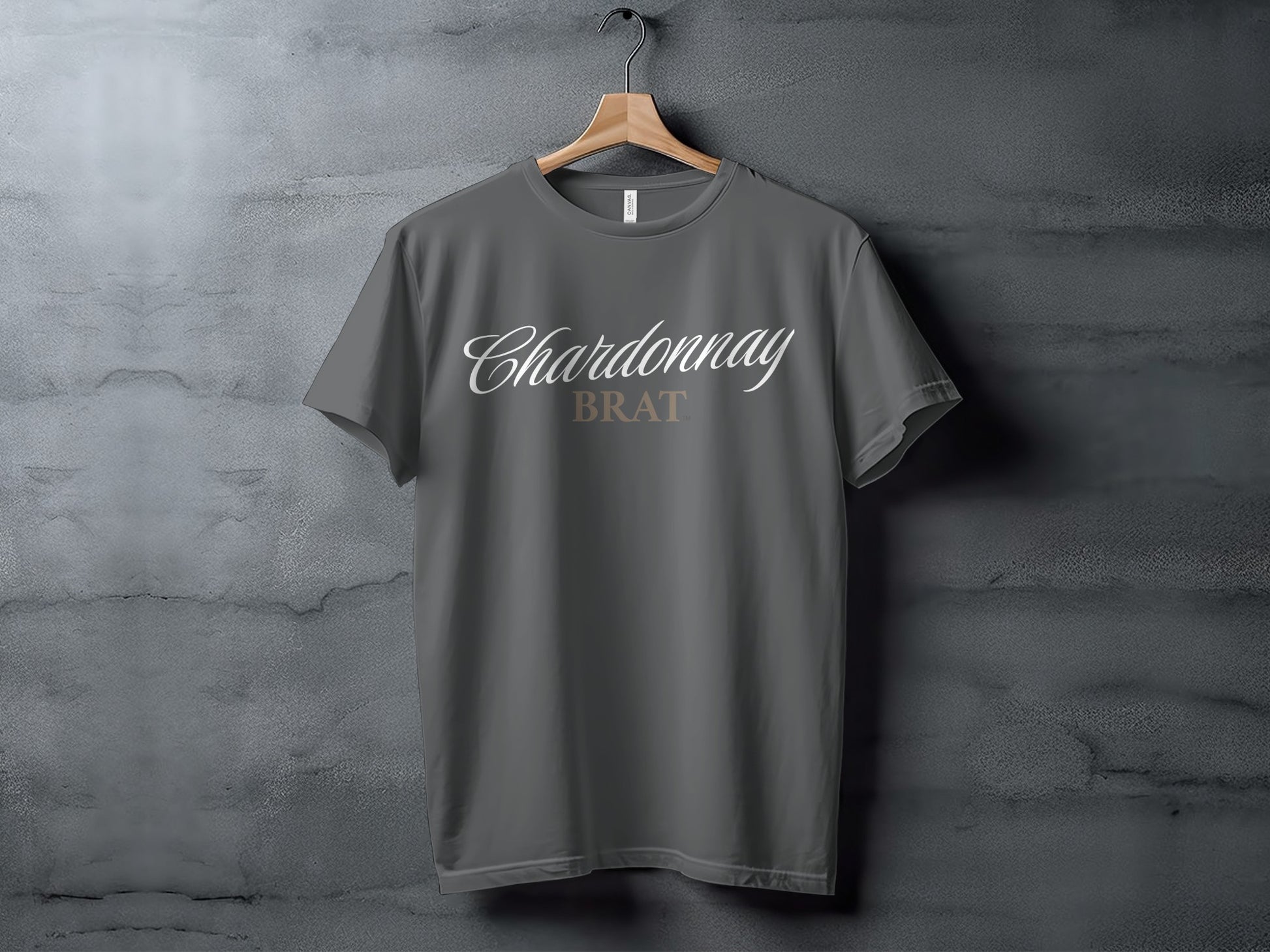 T-shirt with "Chardonnay BRAT" text displayed in cursive and block font.