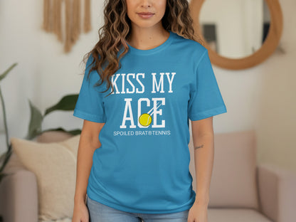 Blue t-shirt with "KISS MY ACE" and tennis ball graphic.
