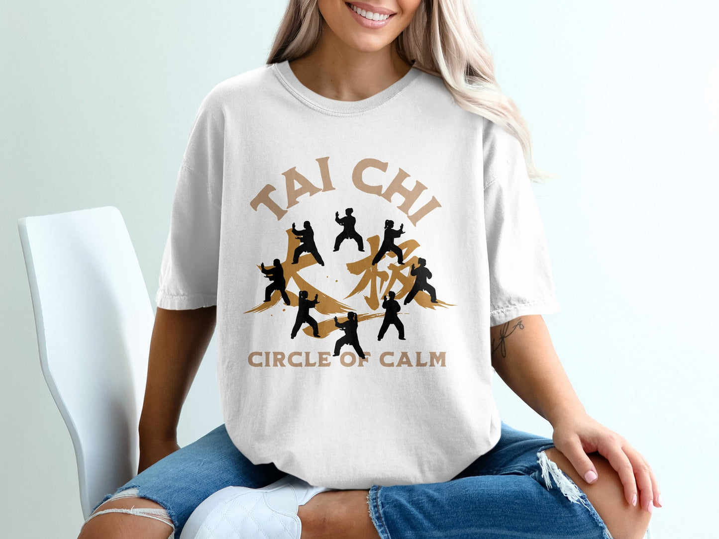 White t-shirt with "Tai Chi Circle of Calm" and silhouette figures.