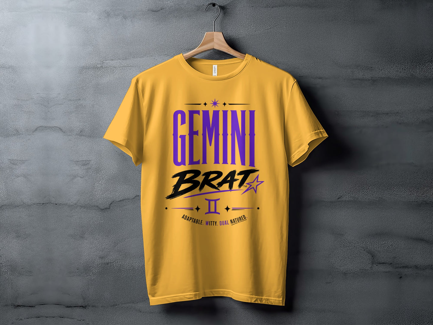 Yellow t-shirt with "GEMINI BRAT" text and Gemini astrological symbol.