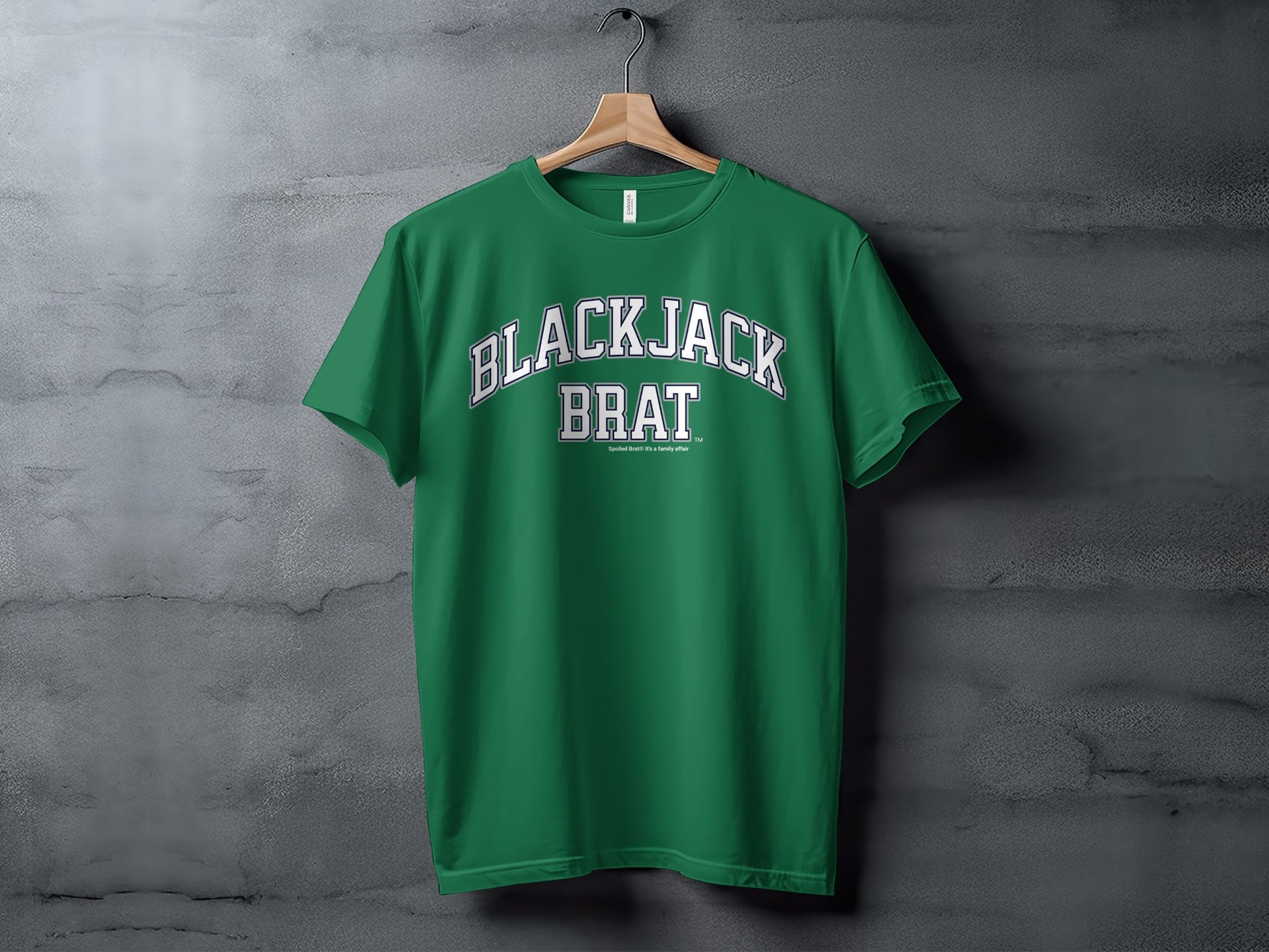 Green t-shirt with "BLACKJACK BRAT" and "Spoiled Brat® It's a family affair" text.