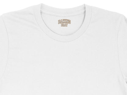 White t-shirt with "BAKING BRAT" text on the collar.
