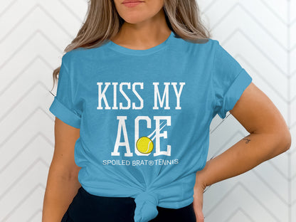 Blue t-shirt with "KISS MY ACE" and tennis ball graphic.