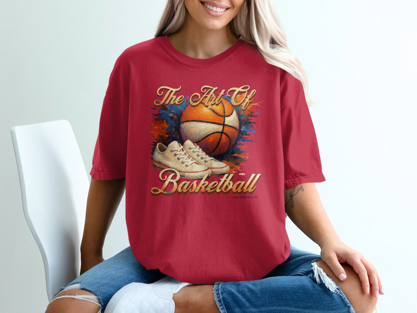 Red t-shirt with "The Art of Basketball" text and basketball graphics.