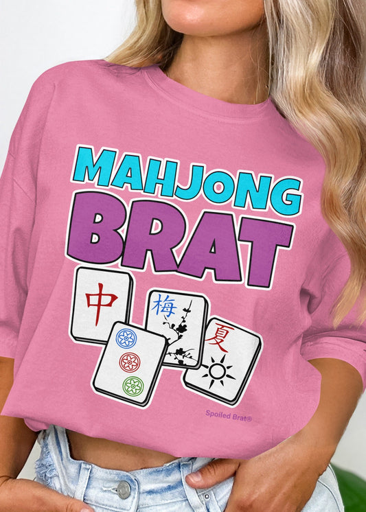 Pink t-shirt with "Mahjong Brat" and three Mahjong tiles.