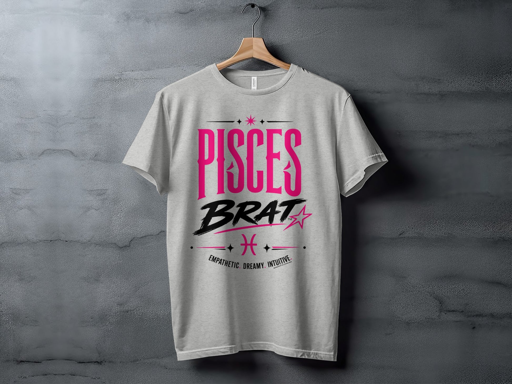 Light gray t-shirt with "PISCES BRAT" and Pisces zodiac symbol in pink and black.