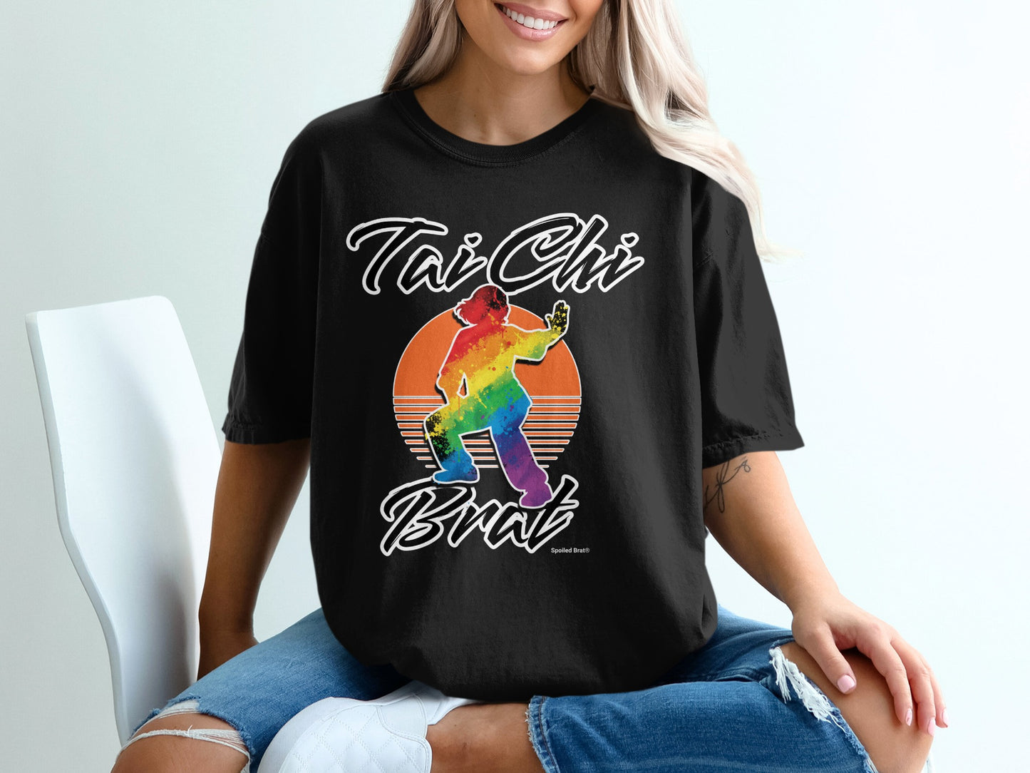 Black t-shirt with rainbow Tai Chi practitioner and "Tai Chi Brat" text.