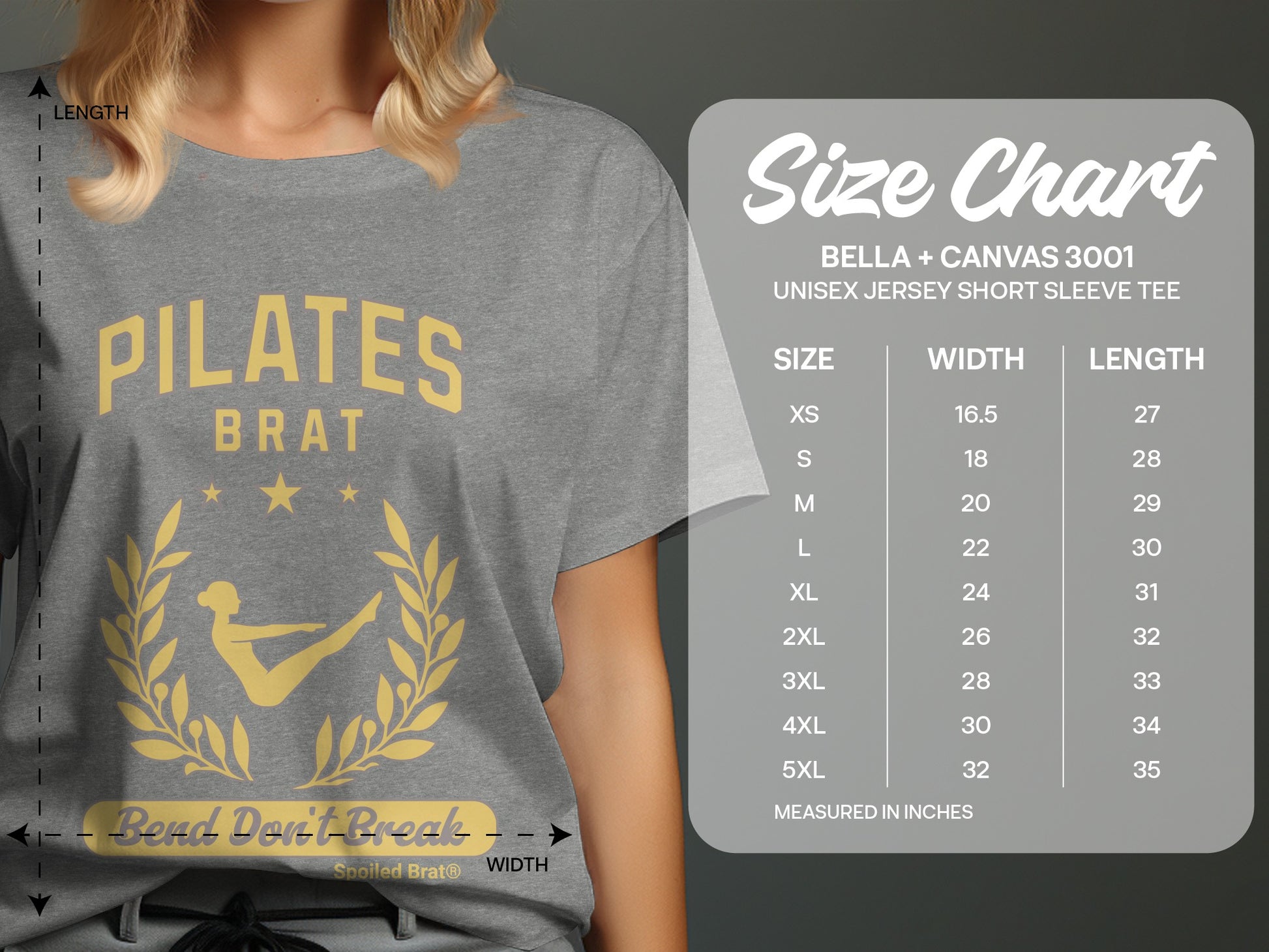 Grey t-shirt with "PILATES BRAT" text and laurel wreath design with size chart.