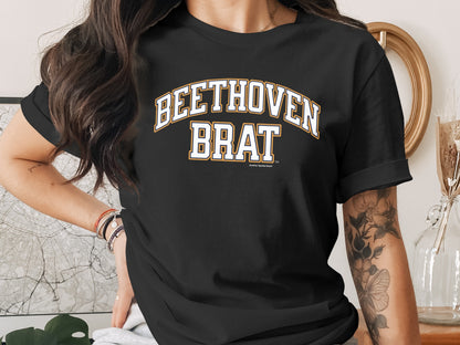 Black t-shirt with "BEETHOVEN BRAT" text in white and orange lettering.