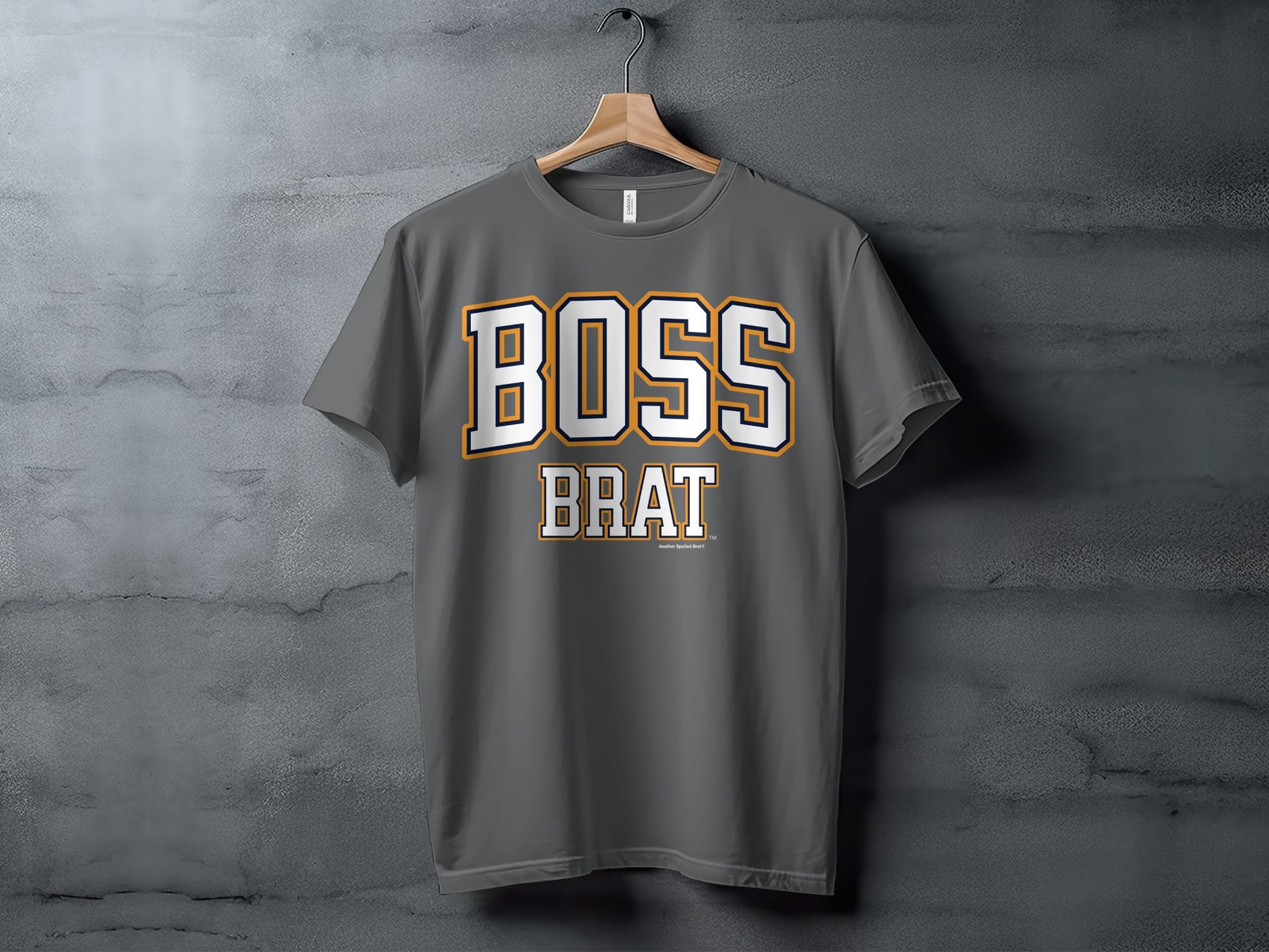 Dark grey t-shirt with "BOSS BRAT" text in white and orange lettering.