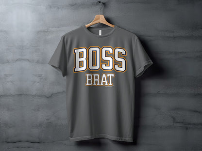 Dark grey t-shirt with "BOSS BRAT" text in white and orange lettering.