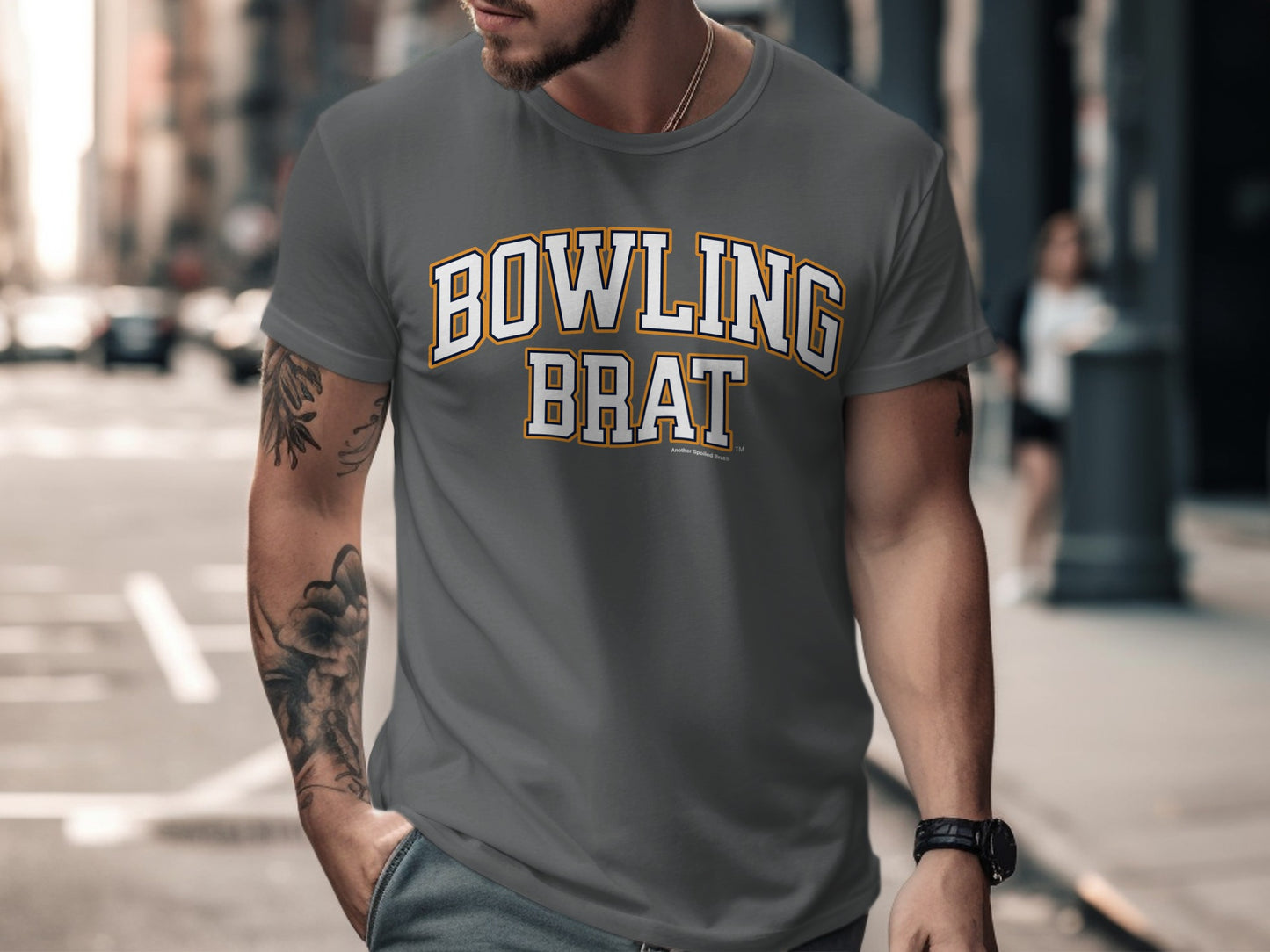 Grey t-shirt with white and orange "BOWLING BRAT" text.