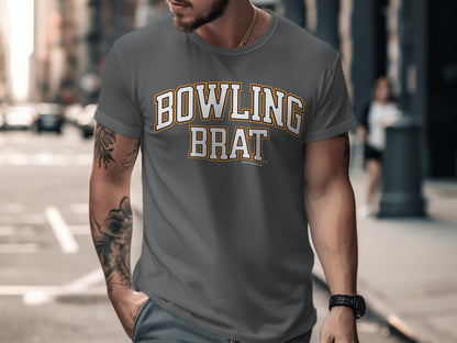 Grey t-shirt with white and orange "BOWLING BRAT" text.