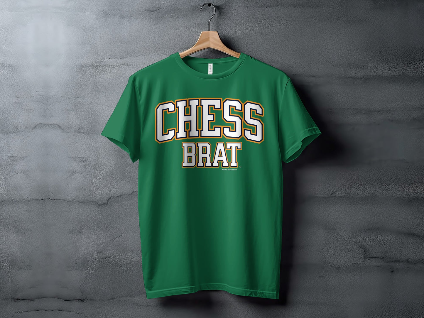 Green t-shirt with bold white text "CHESS BRAT" and "Another Spoiled Brat" logo.