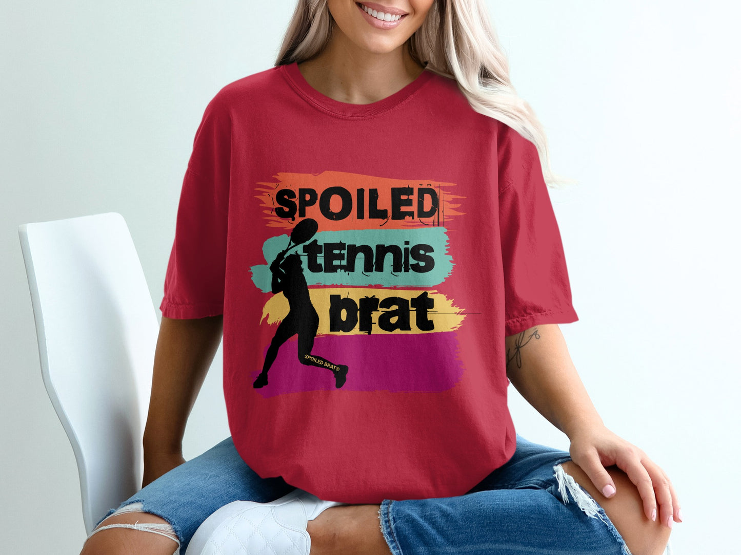Red t-shirt with "SPOILED TENNIS BRAT" graphic and silhouette of a tennis player.
