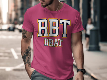 Pink t-shirt with "RBT BRAT" graphic text and small text "Another Spoiled Brat"