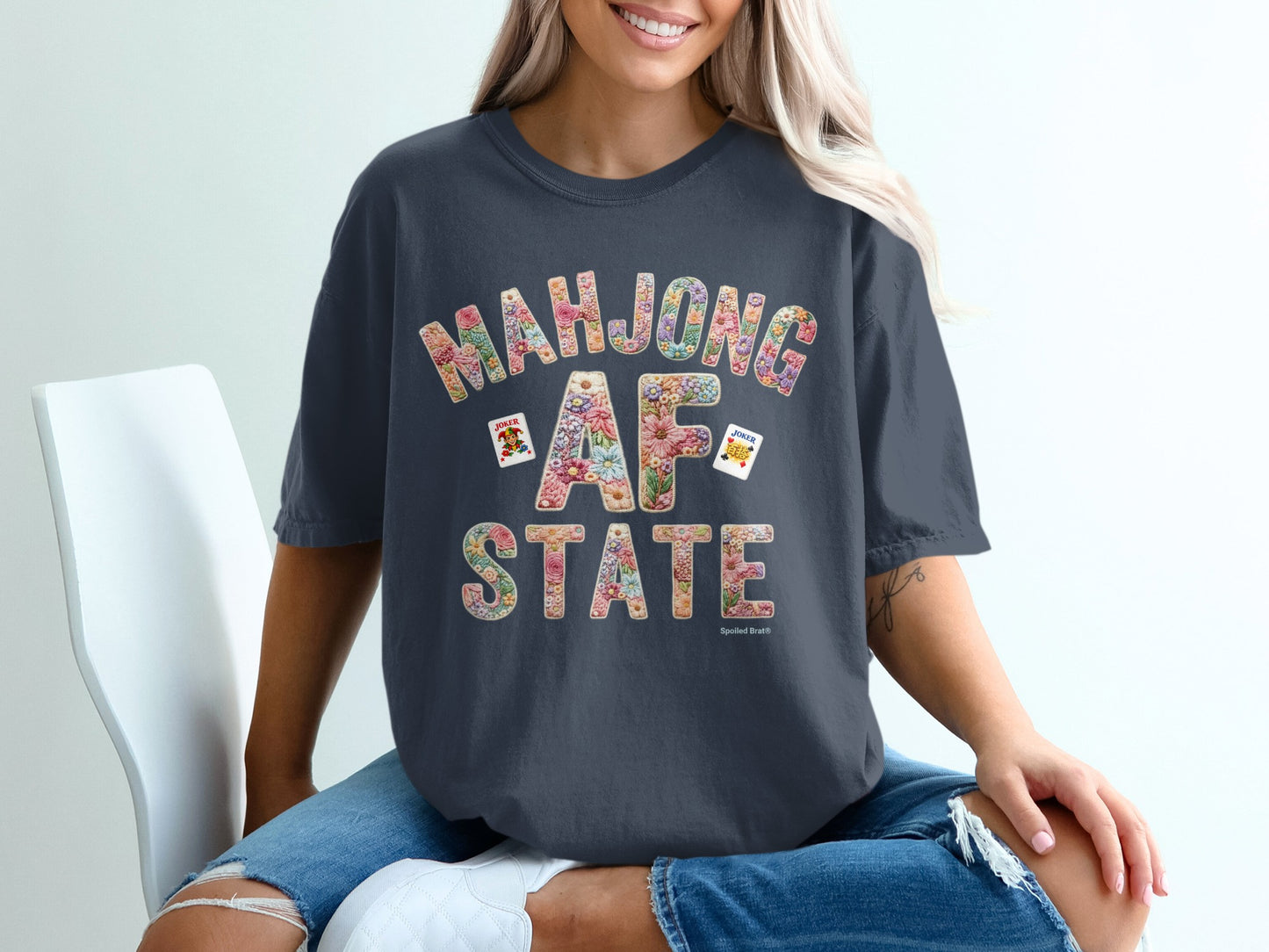 Mahjong AF State t-shirt with floral letters and card graphics.