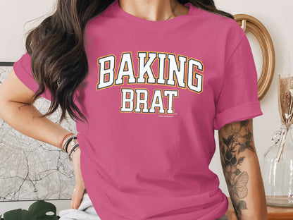 Pink t-shirt with "BAKING BRAT" text and small "Another Spoiled Brat®" detail.