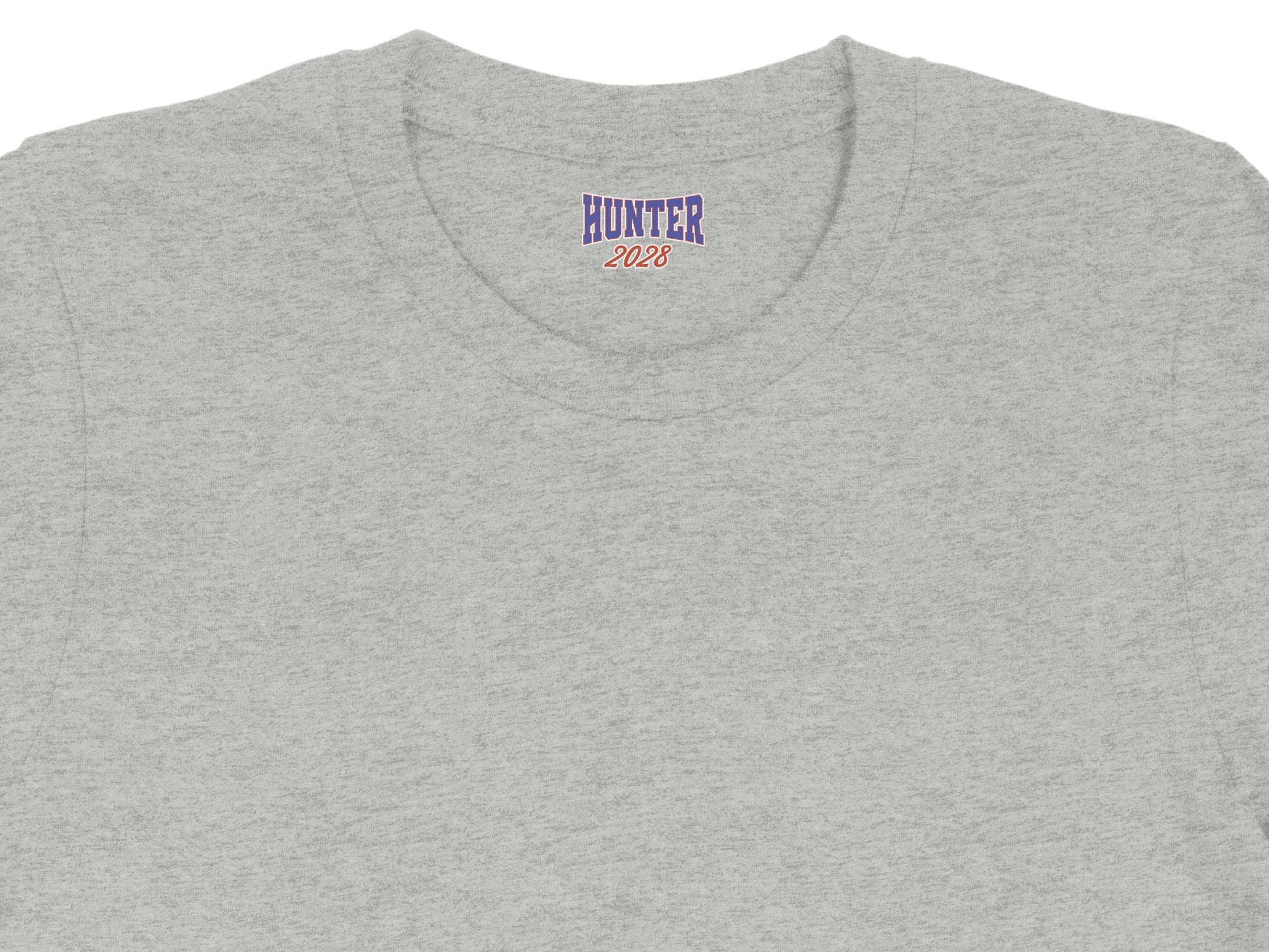 Grey t-shirt collar with blue and red "HUNTER 2028" graphic.