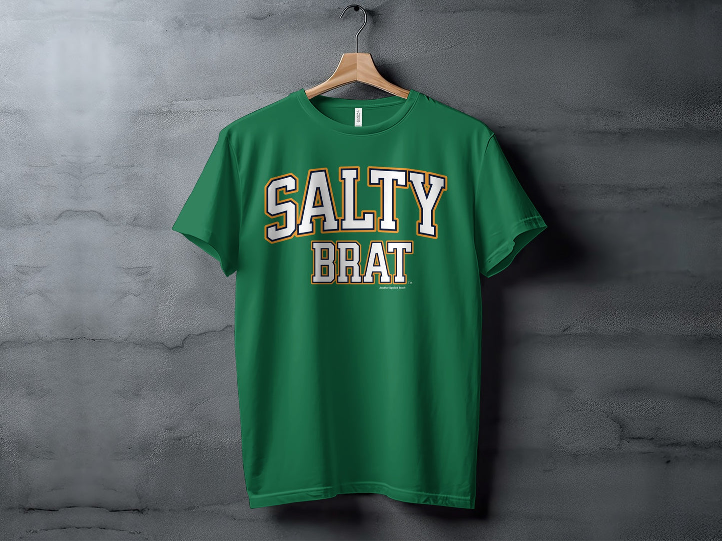 Green t-shirt with "SALTY BRAT" text in white and gold collegiate font