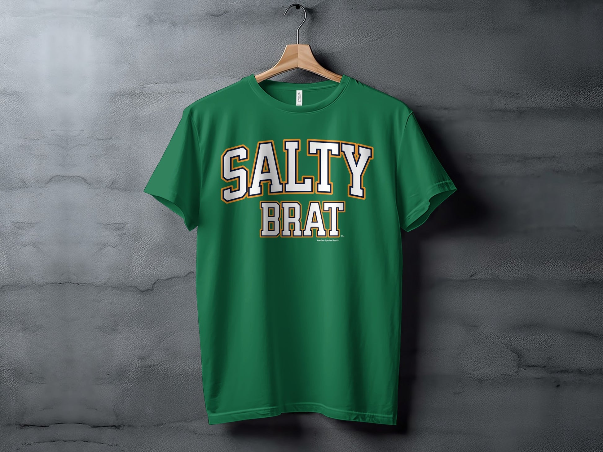Green t-shirt with "SALTY BRAT" text in white and gold collegiate font