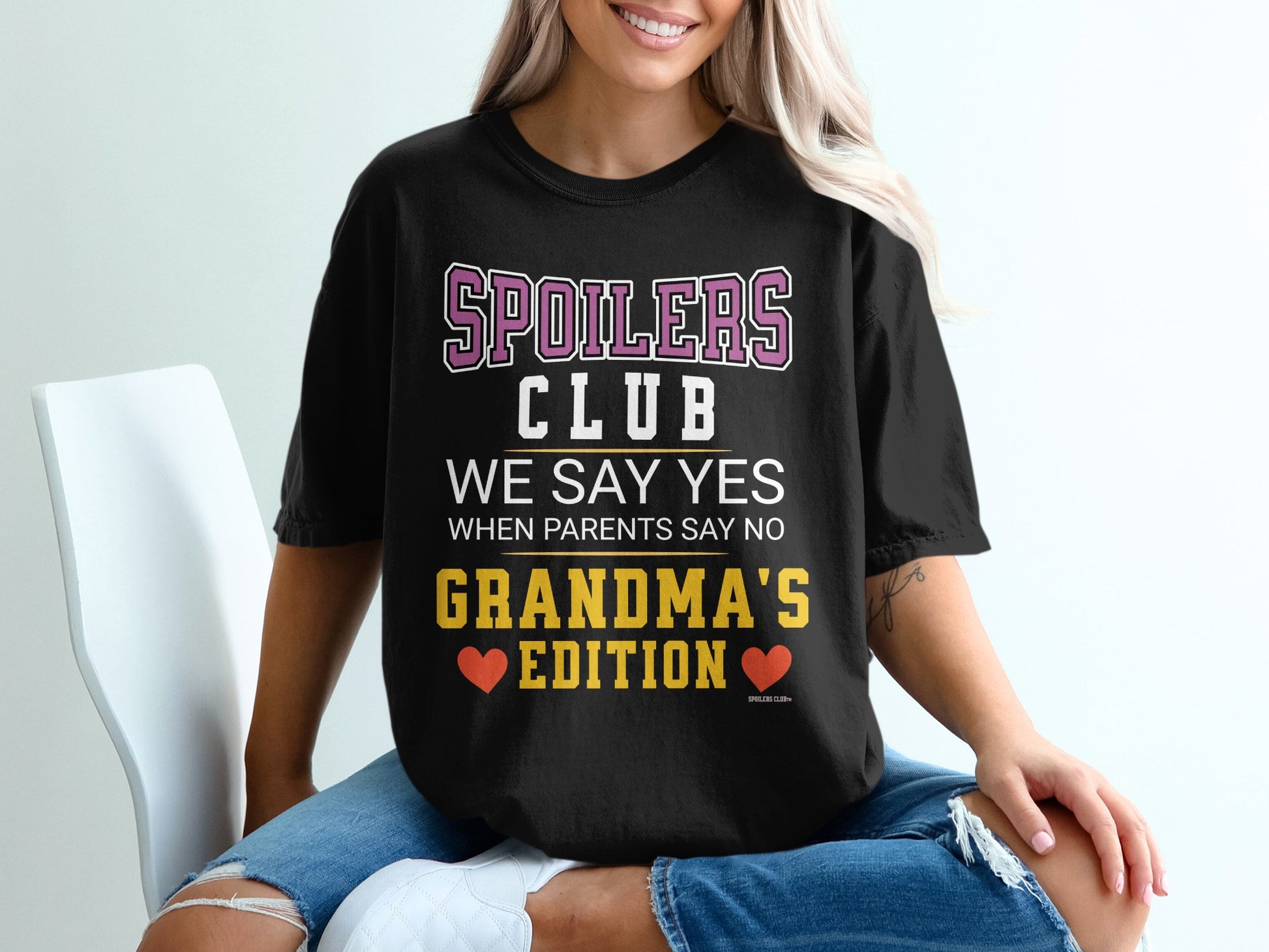 Black t-shirt with "Spoilers Club We Say Yes When Parents Say No Grandma's Edition" text.